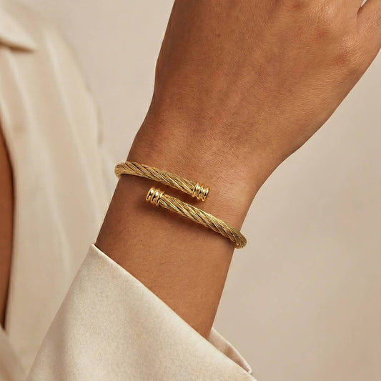 SIGNATURE TWIST CUFF BRACELET - 18CT GOLD PLATED STEEL